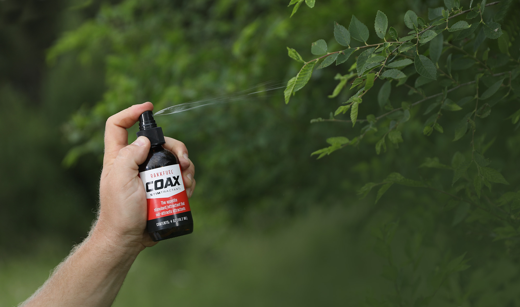 COAX bottle spraying leaves