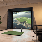 ndoor golf simulator setup showing realistic course graphics.