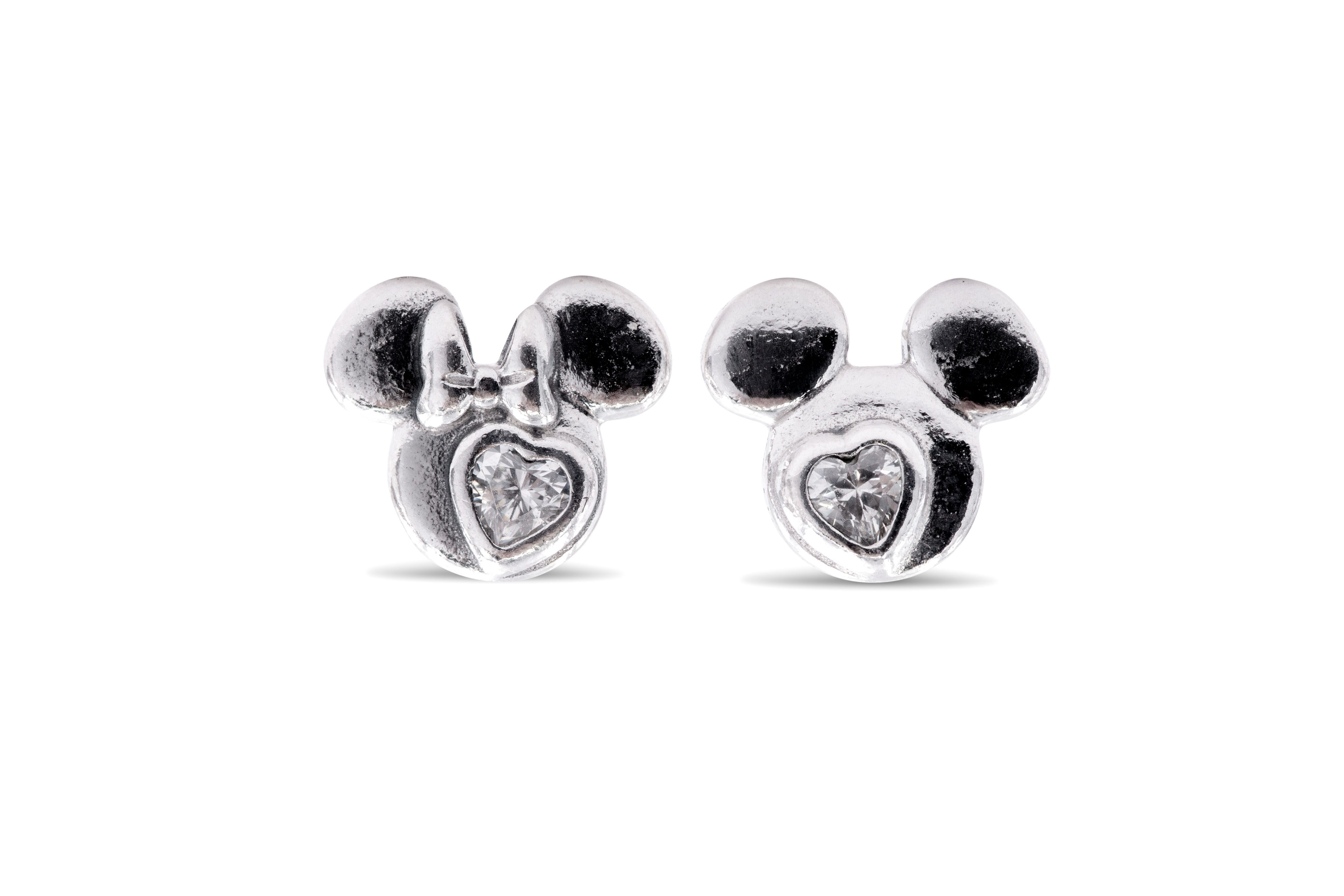 Sold at Auction: Genuine PANDORA MICKEY & MINNIE MOUSE SILVER BRACELET  CHARMS. Complete with a full set of Pandora Silver marks on back.