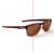The Jungle sunglasses showing ebony color with sun and brown color without sun