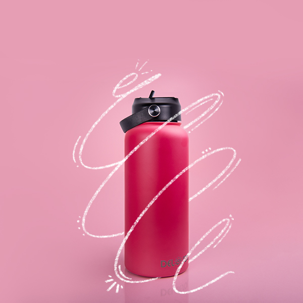 dark pink color changing water bottle on a light pink background