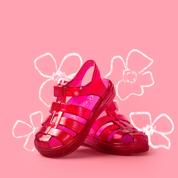 pink color changing shoes on a light pink background