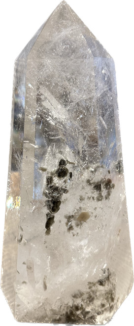 Unique Tourmalinated 3.12kg Quartz Point. This item is PICK-UP ONLY at our boutique location. Features a rare dark blue tourmaline.
Protector from negative thoughts and emotions.