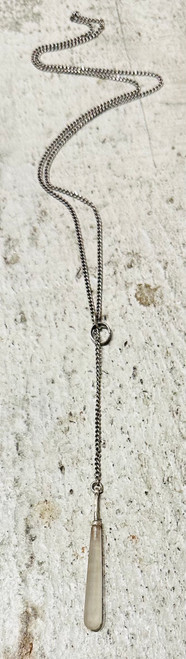 Uniquely designed Karen Landon original. 22" sterling silver chain with frosted crystal "droplet"