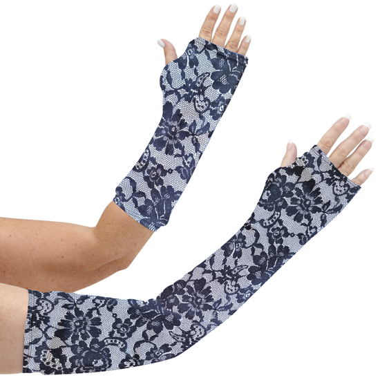 Long and short arm cast or brace cover that looks like elegant black lace (on a white/gray background), but is actually a printed design. 