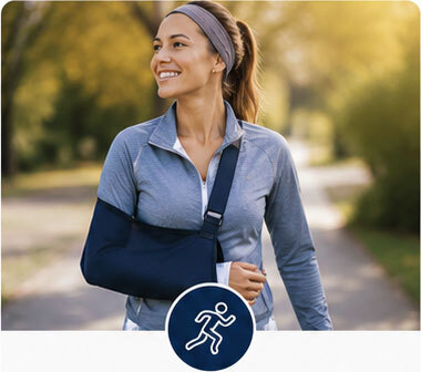 Athletes & Active Lifestyles: Active woman outdoors wearing an arm sling during recovery