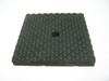 Chicago Pneumatic Vibration Pad, 4 inches by 4 inches by 1/2 inch, black textured rubber with rounded bumps and a central hole.