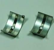 Chicago Pneumatic Bearing Insert #048AD0, image showing two bearing inserts with metal construction and circular features