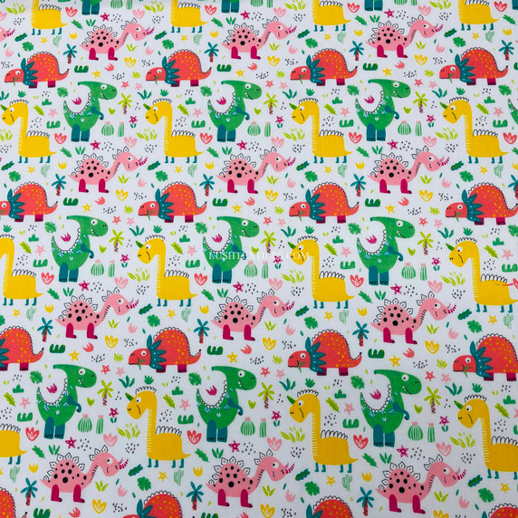 Kids colourful dino/dinasours printed Polycotton dressmaking crafts quilting dolls house Fabric by Prestige Fashion