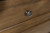 https://ashleyfurniture.scene7.com/is/image/AshleyFurniture/B779-KNOB-DETAIL?&hei=420