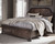 Adinton - Brown - 7 Pc. - Dresser, Mirror, California King Panel Bed With 2 Storage Drawers, 2 Nightstands