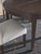 Adinton - Reddish Brown - 5 Pc. - Extension Table, 4 Side Chairs