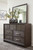 Brueban - Rich Brown - 8 Pc. - Dresser, Mirror, Chest, California King Panel Bed With 2 Storage Drawers, 2 Nightstands