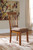 Berringer - Rustic Brown - 3 Pc. - Drop Leaf Table, 2 Side Chairs