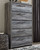 Baystorm - Gray - 7 Pc. - Dresser, Mirror, Chest, Queen Panel Bed With 2 Storage Drawers