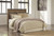 Trinell - Brown - 4 Pc. - Dresser With Fireplace Option, Mirror, Queen Panel Headboard, Nightstand