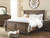Flynnter - Medium Brown - 7 Pc. - Dresser, Mirror, Chest, California King Panel Bed, Nightstand