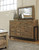 Sommerford - Brown - 7 Pc. - Dresser, Mirror, King Panel Bed With Footboard Storage, 2 Nightstands