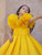 Yellow Couture Gown With Hair Accessory