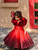 Shaded Red Couture Gown With Hair Accessory