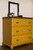 Dresser with antique brass label holders
