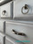 dresser with satin nickel ring pull