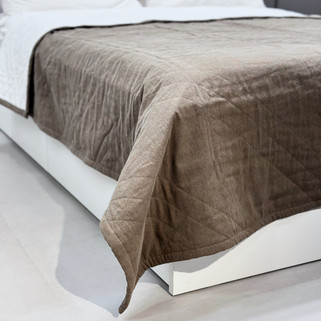 brown organic cotton bed quilt