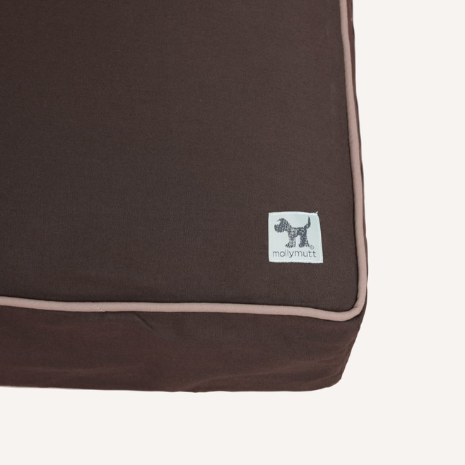 dark brown and tan dog bed cover