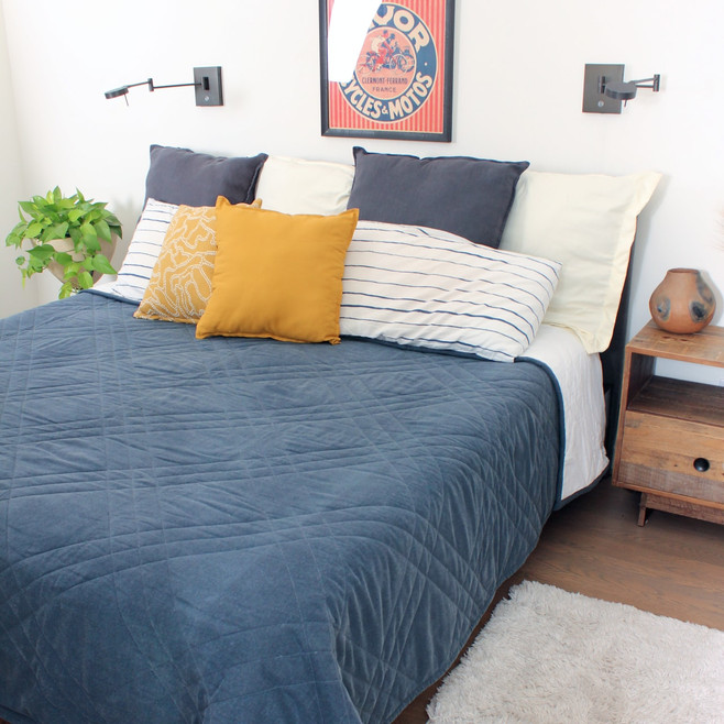 dark blue quilted organic bed quilt