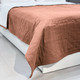 dusty pink quilted bed coverlet