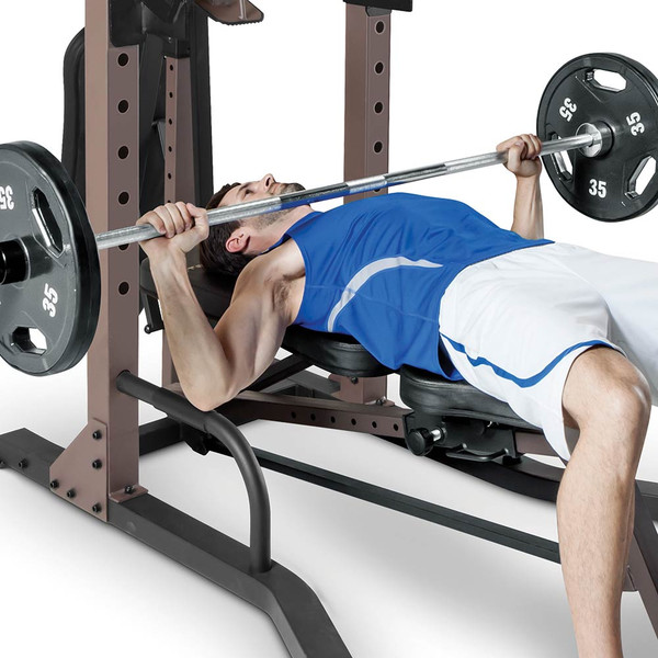 The Steelbody STB-98502 Power Tower with Foldable Bench in use - bench press