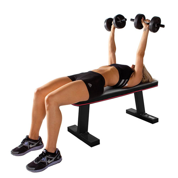 The Marcy SB-10510 Flat Bench utilized by model to do bench presses