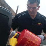 Eagle 5 Gal. Red Steel Safety Can - Flammables, Man Pouring with Can