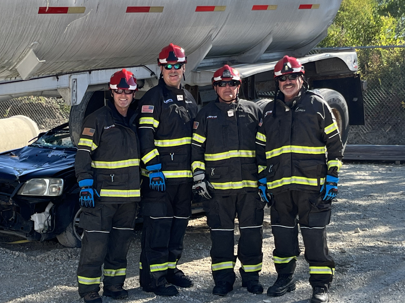 Photo of a Hurst eDRUALIC rescue tool cutting in to a vehicle.
