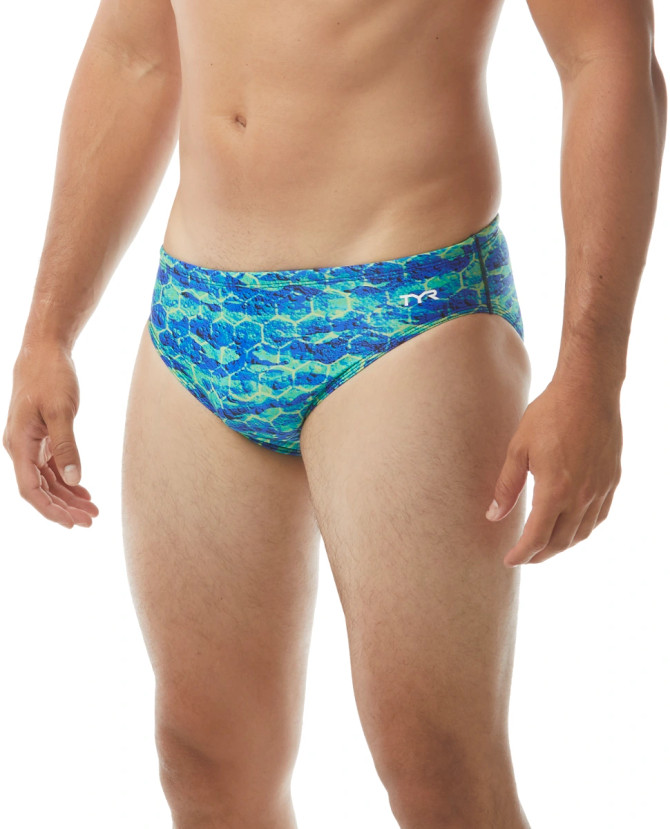 Stay a step ahead of the competition in the TYR Men's Agran Brief Swimsuit.

Constructed with TYR's most durable textile, Durafast Elite® - the RAGO7A performance swimsuit utilizes high denier poly fiber and innovative circular knit construction to combine the strength and colorfastness of polyester with the comfort of spandex. Featuring a fitted brief style, adjustable drawcord waist and bold print, the TYR racer is ideal for athletes who want a combination of minimal coverage and comfortable support during every swim..

TYR performance swimsuits are fully lined, provide UPF 50+ sun protection, 360 degree range of motion and an antimicrobial lining for freshness. All Durafast Elite® suits are chlorine proof and sustain an impressive 300+ hours of performance.

TYR Durafast Elite®: 94% Polyester / 6% Spandex