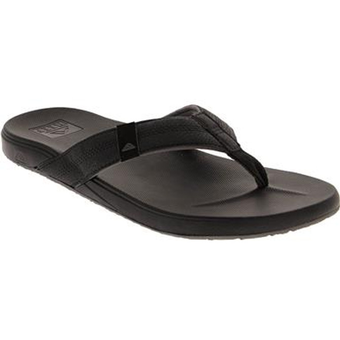 Reef Cushion Bounce Phantom Mens Flip Flops. Put a little bounce in your step with these incredibly comfortable mens flip-flop sandals. These easy-on sandals are crafted with a signature Cushion Bounce footbed, created to be ultra resilient and rebound you into your next step. The contoured heel and supportive arch help prevent tired feet and calves, allowing for comfortable walking all day. A high-density rubber outsole makes them flexible and durable as well as offering better traction for use in wet areas. A great addition to your warm-weather wardrobe!

Features:

Rubber outsole
Molded arch support and heel cup
Signature Cushion Bounce footbed
Water safe