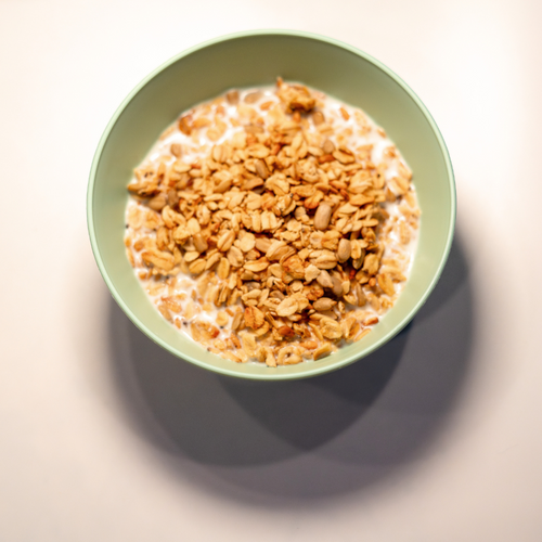 Back-to-Basics Granola with milk in green bowl