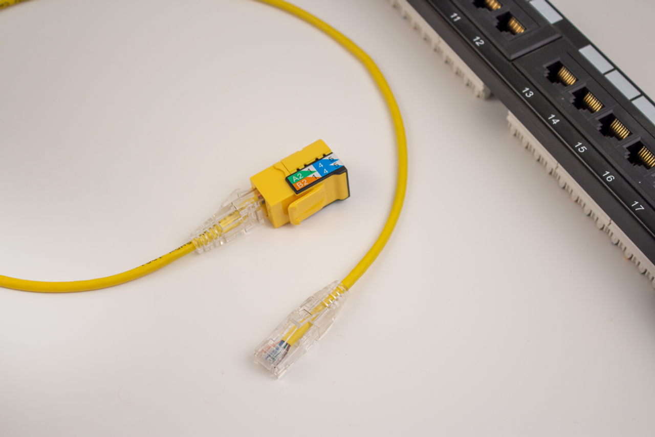 Category-6A Slim Type Mold-Injection-Snagless Patch Cord, 1ft, 28AWG Stranded, PVC Jacket, Yellow.
