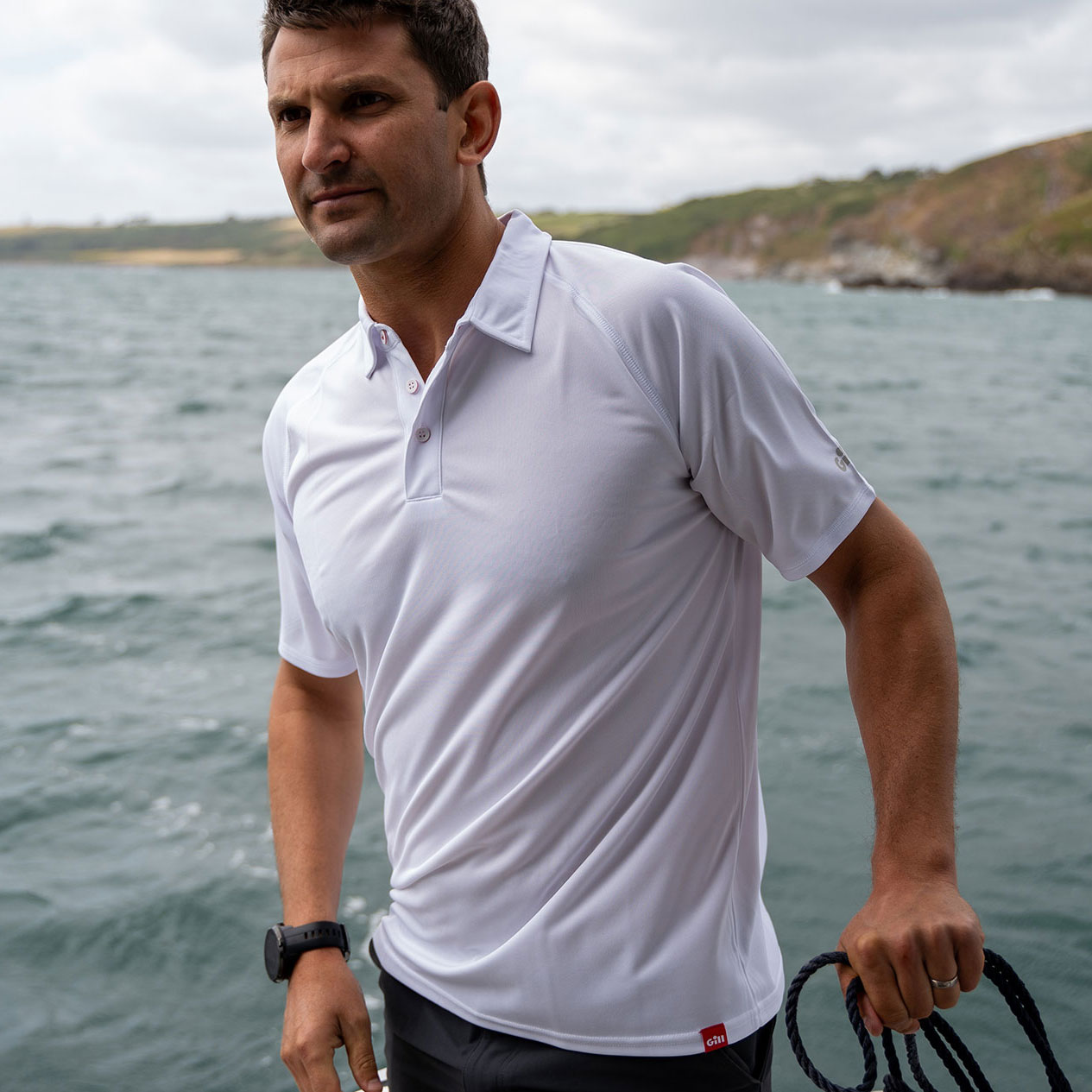 Men's UV Tec Polo - UV008-WHI01-LIFESTYLE-1.jpg