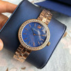 Swarovski Women's Glittering Blue Daytime Bracelet Watch in Rose Gold 