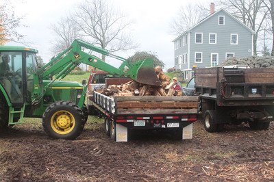 Loading  firewood for a customer