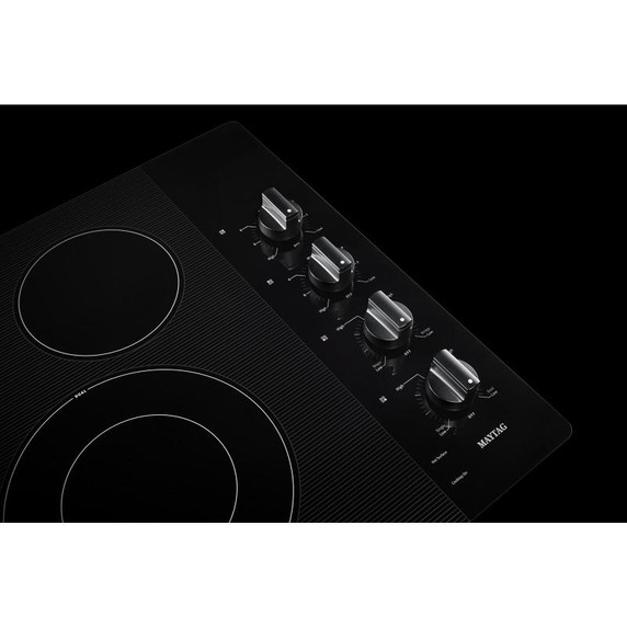 Maytag® 30-Inch Electric Cooktop with Reversible Grill and Griddle MEC8830HB