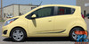 Chevy Spark ARC Side Stripe Decals – Profile View. A yellow Chevy Spark featuring ARC side stripe decals in black, enhancing the vehicle’s sporty look. Designed for 2013-2016 models with precision-cut vinyl graphics.