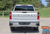 Rear view of a silver Chevy Silverado with tailgate letter vinyl decals. OE factory-style graphics add a custom touch to the 2019-2026 Silverado truck.