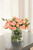 Light Pink Roses in Round Glass Vase