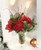 Mixed Garden with Red Roses, Mums, Amaryllis in Flared Glass Vase