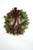 Magnolia Leaf Wreath with Crimson Berries and a Crimson Ribbon with Gold Trimming