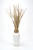 DRIED RUSH GRASS AND MAHOGANYPODS IN TALL WHITE RIBBED VASE
