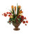 Orchids, Berries, Ranunculus, Protea in Acanthus Leaf Compote