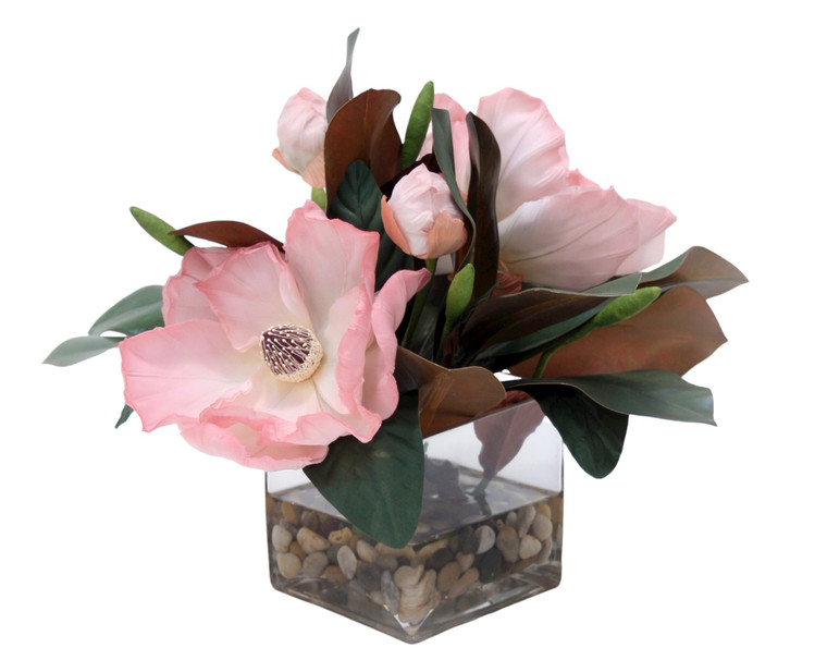 Soft Pink Magnolia Blooms And Foliage In Square Glass Vase